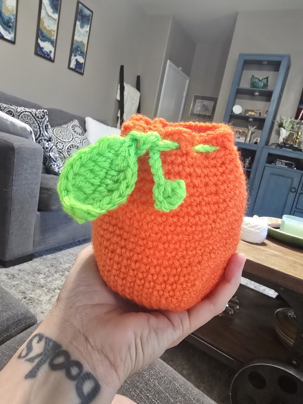 Handmade By Me Crocheted Orange with Green Leaf